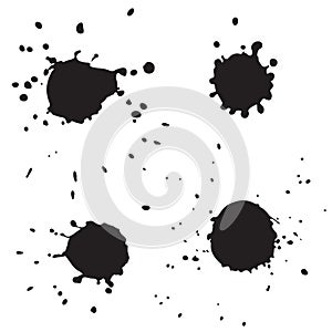 Black round ink blots with splatter isolated on white background