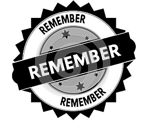 Black round stamp with REMEMBER text.