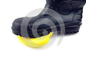 Black rubber boots with banana