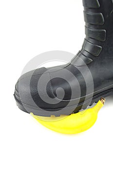 Black rubber boots with banana