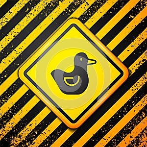 Black Rubber duck icon isolated on yellow background. Warning sign. Vector