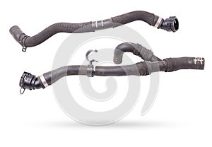 Black rubber hose of the car engine cooling system on a white isolated background in a photo studio for replacement during repair