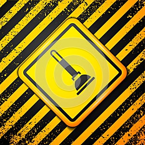 Black Rubber plunger with wooden handle for pipe cleaning icon isolated on yellow background. Toilet plunger. Warning
