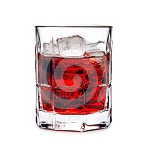 A Black Russian cocktail in crystal-clear glass sits against a white background