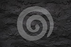 Black rustic limewash plaster wall texture