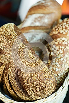 Black rye bread buns, healthy diet food, close-up.