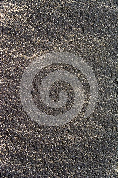 Black sand beach background macro photography