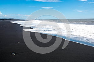 Black sand beach, Reynisfjara shore near the village Vik, atlantic ocean, Iceland