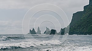 The black sand beach of Reynisfjara in the southern coast of Vik, Iceland