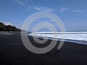 Black sand beach in Yogyakarta, Indonesia