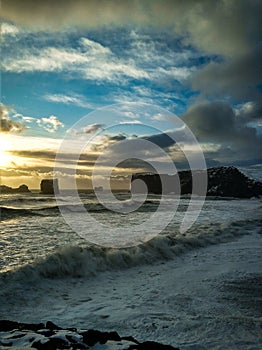 Black sand beaches with snow photo