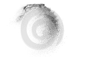 Black sand explosion isolated on white background.