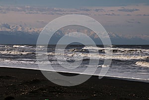 Black sand with magnetite on the beach in Ureki