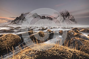 Black sand and Vestrahorn mountains at Stokksnes photo