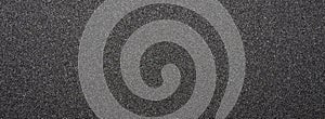 Black sandpaper.Texture of black sandpaper.