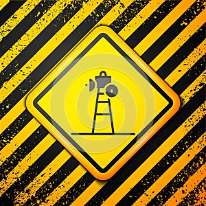 Black Satellite dish icon isolated on yellow background. Radio antenna, astronomy and space research. Warning sign