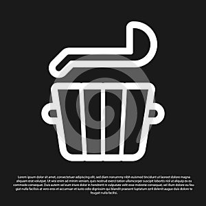 Black Sauna bucket and ladle icon isolated on black background. Vector