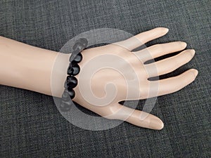 Black scull beads bracelet Lord Shiva worship on mannequin hand