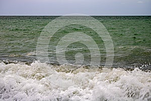 The Black Sea before an approaching storm on a hot sunny day with the clearest sea water in Sochi Loo