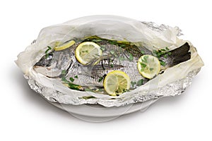 Black sea bream wrapped in paper and baked, Italian cuisine