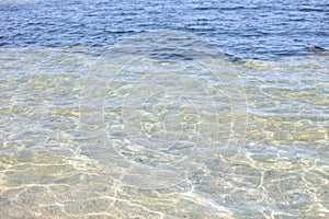 Black sea clear blue water near island in Skadovsk Ragion, Kherson Oblast near Crimea. Europe. Tourism high season , hot summe