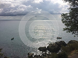 Black Sea on a cloudy autumn day. Boats. Alupka