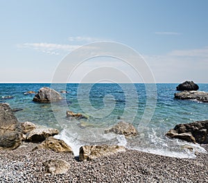 Black sea and stony beach