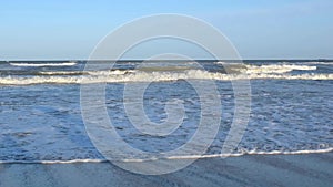 Black Sea waves crushing on the sand beach