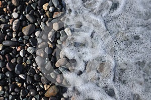 Black Sea. Waves washing down rocky beach