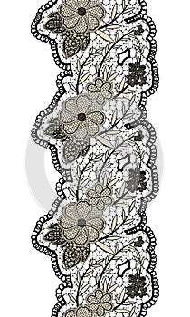 Black seamless lacy vertical ribbon on white background. Floral seamless border for design.
