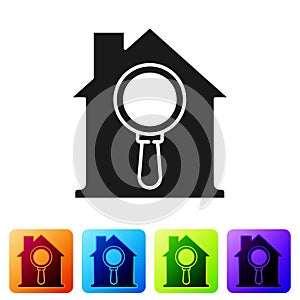 Black Search house icon isolated on white background. Real estate symbol of a house under magnifying glass. Set icons in