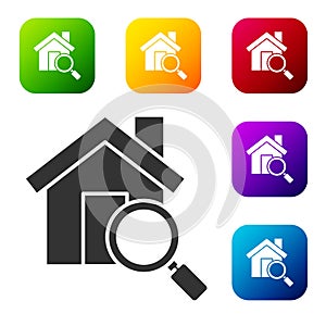 Black Search house icon isolated on white background. Real estate symbol of a house under magnifying glass. Set icons in