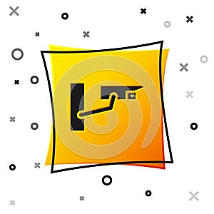 Black Security camera icon isolated on white background. Yellow square button. Vector