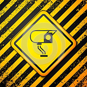 Black Security camera icon isolated on yellow background. Warning sign. Vector