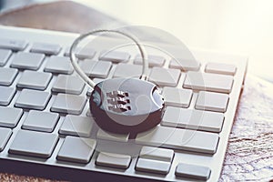 Black security lock with pass-code or password on computer keyboard