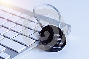 Black security lock with pass-code or password on computer keyboard