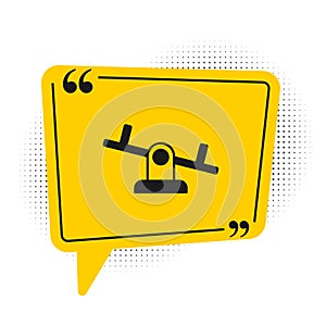 Black Seesaw icon isolated on white background. Teeter equal board. Playground symbol. Yellow speech bubble symbol