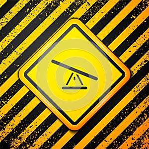 Black Seesaw icon isolated on yellow background. Teeter equal board. Playground symbol. Warning sign. Vector