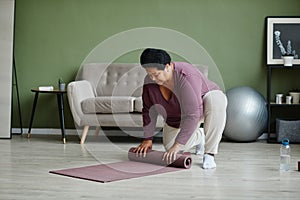 Black Senior Woman at Home Workout