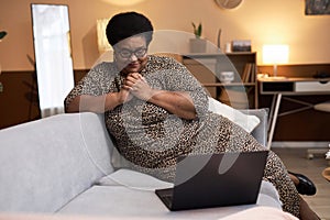 Black Senior Woman Watching Drama Tv