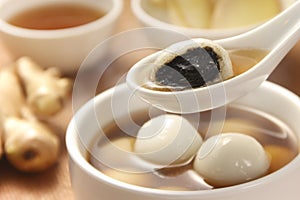 Black Sesame Dumpling in Sweet Ginger Tea. photo