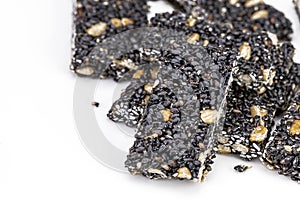 Black Sesame seeds Bar, sweet snack on white background