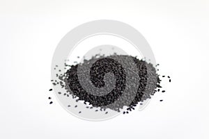 Black sesame seeds isolated on white background