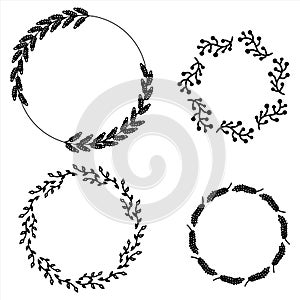 Black set of floral hand-drawn brushes borders round frames, elements in doodle style on white background. Berry christmas ear of