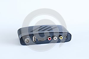 Black set top box for digital television on a white background.