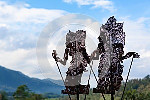 Black shadow silhouette of traditional Balinese puppets Wayang Kulit