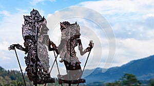 Black shadow silhouette of traditional Balinese puppets Wayang Kulit