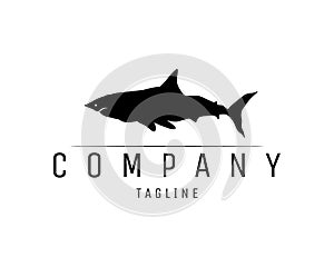 black shark logo isolated on white background showing from side.