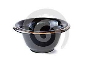 Black shaving bowl with silver edging isolated on white