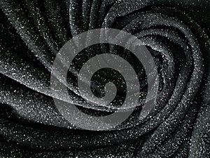 Black shinny spiral background.